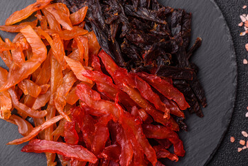 Jerky, dried chicken slices with salt and spices
