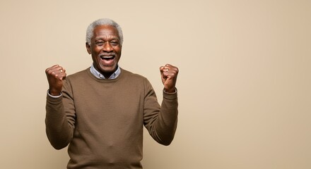 Joyful Older African American Man Celebrating Success Beige Background