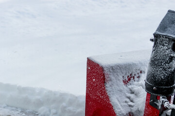 edge of a snowblower after a winter weather event. white nature landscape blank with space for...