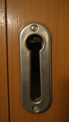 A mysterious scene unfolds through a keyhole focusing on a subject related to security