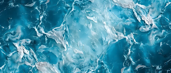 Obraz premium Ocean texture capturing the movement of waves and ripples on the water’s surface. The deep blue hues and fluid motion background