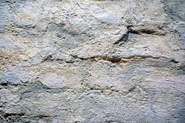 fashionable modern stone uneven wall surface in the interior of the house