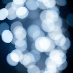 Fototapeta premium Gentle blue bokeh lights blend together to evoke a calming ambiance perfect for creative applications or digital backgrounds Bokeh light lights background bokeh abstract light bright effect s