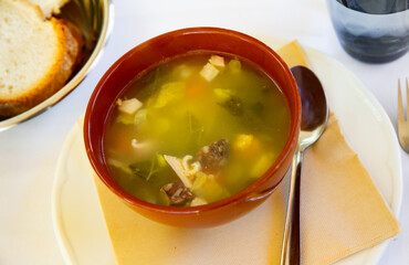 Restaurant serves authentic Catalan food - thick soup of local vegetables, meat, offal and butifarra sausage