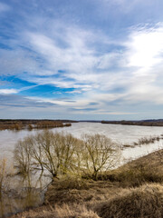 River with a cloudy sky in the background