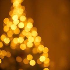 Obraz premium Gold christmas background defocused blurred light bokeh effect Bokeh light lights background bokeh abstract light bright effect shiny