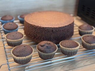 chocolate muffins on a plate festive chocolate cake with candles in gold