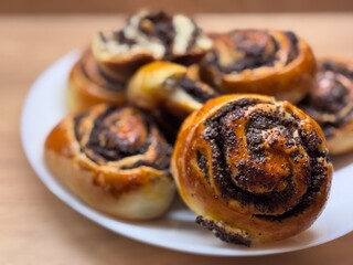 photo of baking, sweet buns with poppy seeds