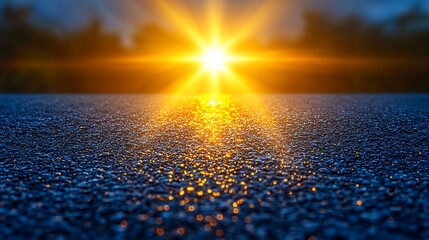 Obraz premium Sunrise over asphalt road, sun rays reflecting, nature background, travel imagery