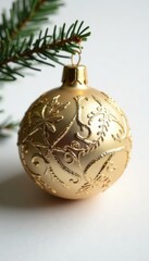 Ornate gold Christmas ornament against pure white , celebration, background, winter