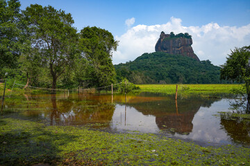 Sigiriya Fortress Rock is an ancient rock fortress located in the northern Matale District near the town of Dambulla in the Central Province, Sri Lanka