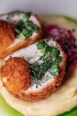 Delicious cutlets with airy mashed potatoes served in the restaurant. The perfect photo for a menu, culinary blog, or an advertisement for catering establishments.