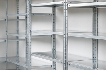Metal rack shelves in a home garage for goods storage