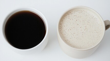 Two cups of coffee, black and latte, on white background