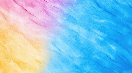Obraz premium A vibrant, abstract gradient blending pink, yellow, and blue hues, creating a soft, textured background.