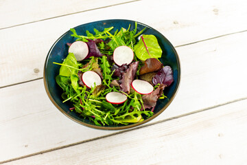 Mixed salad leaves in a bowl