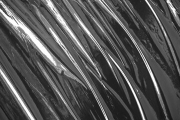 Plastic stretch wrap on black background