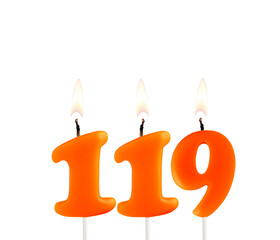 Orange birthday candle on white background - Number 119.