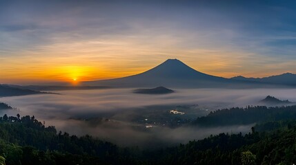 Majestic Volcano Sunrise Over Foggy Landscape