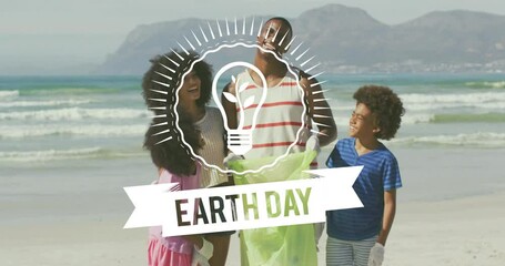 Earth Day animation over family cleaning beach with mountains in background - Powered by Adobe