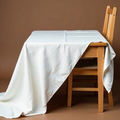 Worn white cotton fabric draped over wooden table and chair, wooden furniture, , rustic atmosphere