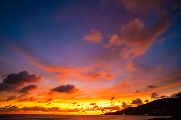 Landscape of colorful clouds in sunset or sunrise sky over sea with reflection in the tropical sea,Beautiful seascape scenery,Amazing light of nature Landscape nature background