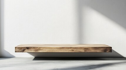 Minimalist Wooden Shelf Against White Wall with Sunlight