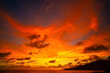 Landscape of colorful clouds in sunset or sunrise sky over sea with reflection in the tropical sea,Beautiful seascape scenery,Amazing light of nature Landscape nature background