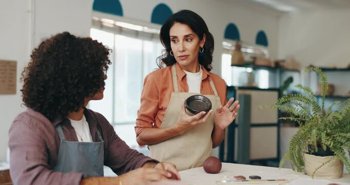 Pottery, teaching and woman with people in workshop for skills with clay, ceramic and sculpture class. Creative, art studio and teacher with group for learning hobby, craft and pattern to mold object