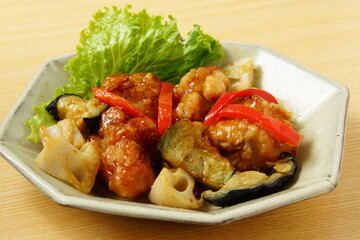 唐揚げと茄子の炒め物