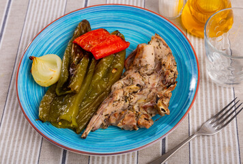 Tender rabbit meat with baked beans and bell peppers