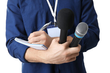 Journalist with microphones taking notes on white background, closeup