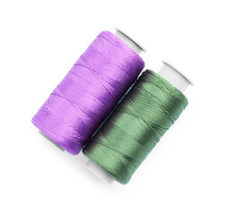 Spools of bright sewing threads isolated on white, top view