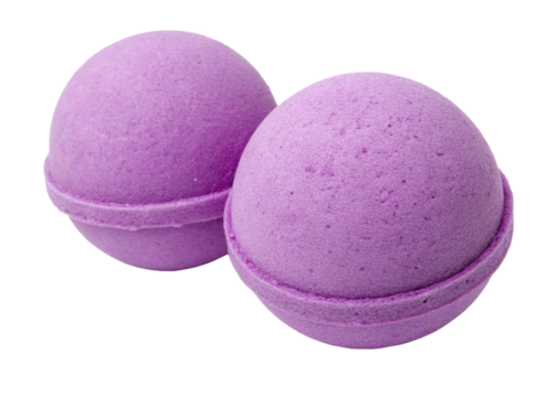 Two purple bath bombs side by side, round with a slight seam around the middle, isolated on a white background. Perfect for spa, relaxation, or bath-related designs. High-quality cutout for easy use.