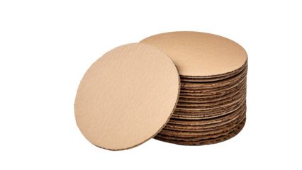 Stack of round cardboard cake boards, perfect for bakery websites, food blogs, or baking tutorials needing professional cake presentation visuals.