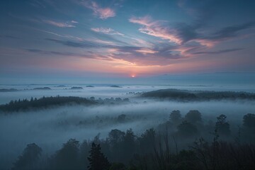 Obraz premium Ethereal Dusk Panorama with Muted Fog and Resplendent Sky