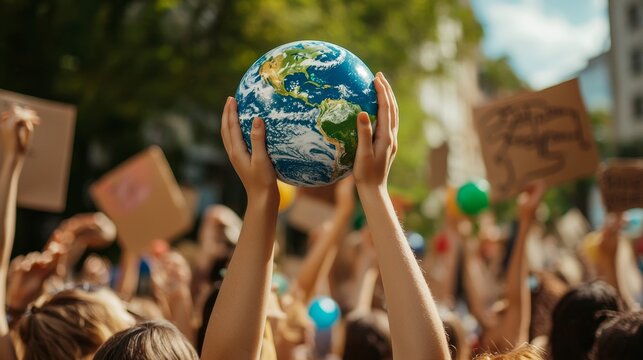 Global climate rally urban park protest event outdoor space crowd perspective advocacy for environmental change