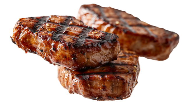 Juicy grilled pork chops floating in the air, a mouthwatering concept for food photography, isolated on transparent background png 