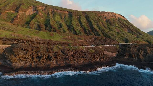 Aerial view of a Coastal highway in Hawaii next to ocean