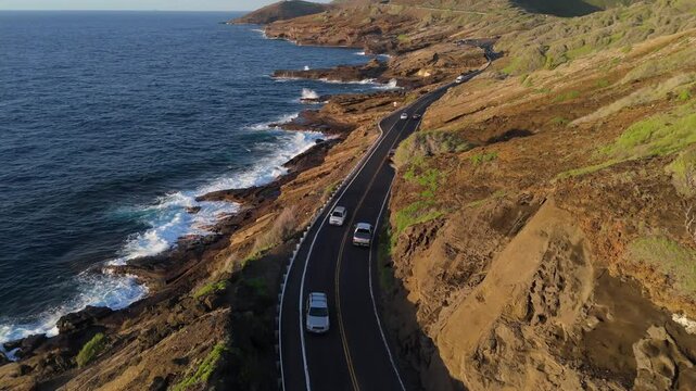 Aerial view of a Coastal highway in Hawaii next to ocean