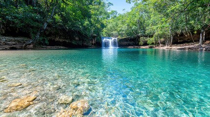 Turquoise waterfall pool in lush jungle. Possible use Nature background