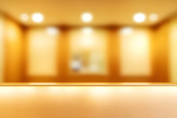 Abstract blurred background of a luxury interior with warm golden tones and a clean, empty surface ideal for product placement or design composition.