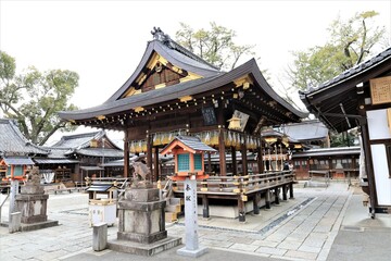 Naklejka premium A scene of Hai-den Hall of Worship in the precincts of Goh-jinjya Shrine in Kyoto City 京都市の護王神社の境内にある拝殿の風景
