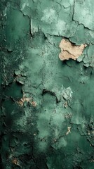 Close-up of weathered green paint with peeling texture on a rustic surface, showcasing decay and age