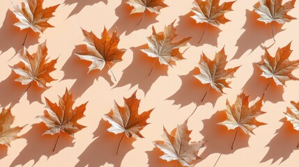Fototapeta premium Autumn leaves pattern, fall design, peach background, sunlight shadows, seasonal decor