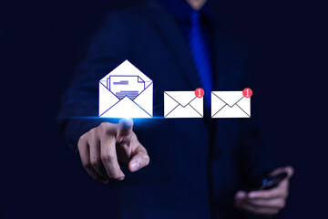 New email notification concept for business email communication. Businessman touching email on virtual screen. Internet technology. Mailbox receives electronic message notification.
