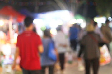 blur colors of fluorescent light colorful in dark for festival temple fair background.