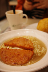 A bowl of luncheon meat instant noodles in a Hong Kong tea restaurant
