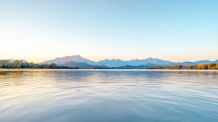 Fototapeta premium Calm lake sunrise, mountain backdrop, tranquil scene, nature photography