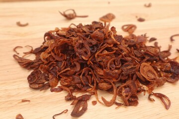 A pile of burnt fried onions, close-up.